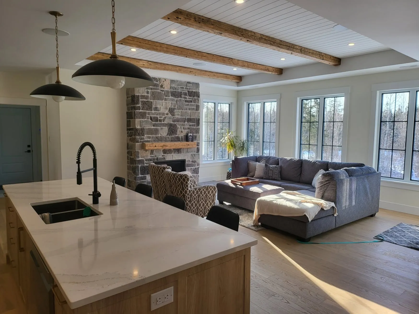Kitchen with white oak island, painted walls and casing